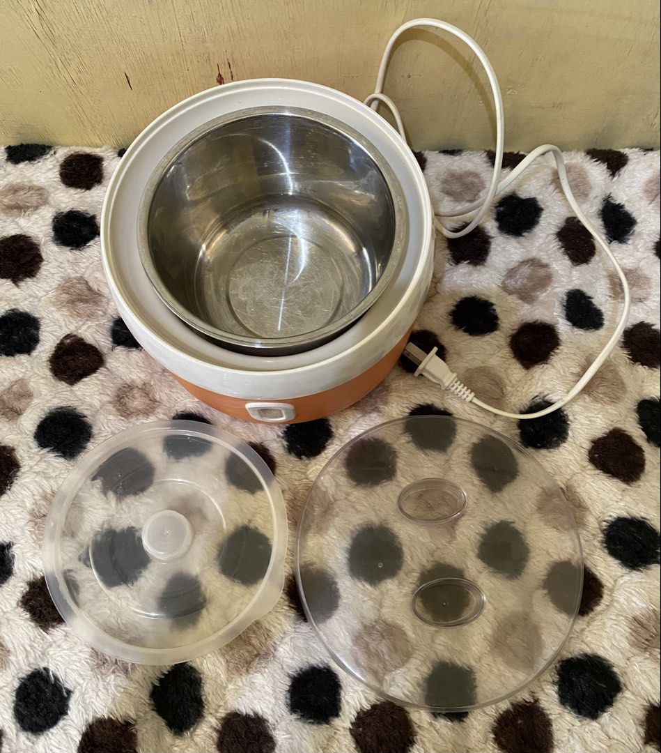 Bear Electric Yogurt Maker (Category: Cookware & Accessories) located in Baguio. Submitted by thrift_bonita (Listing ID 1468528246, Image 3). Description: - Brand: Bear - Color: Orange and white - Condition: Clean, powers on, and works perfectly - Included: Removable stainless steel inner pot, clear lid, inner bowl, and standard two-prong plug - Ideal for: Dorm rooms, quick meals, and heating small portions - Ready for immediate use.
