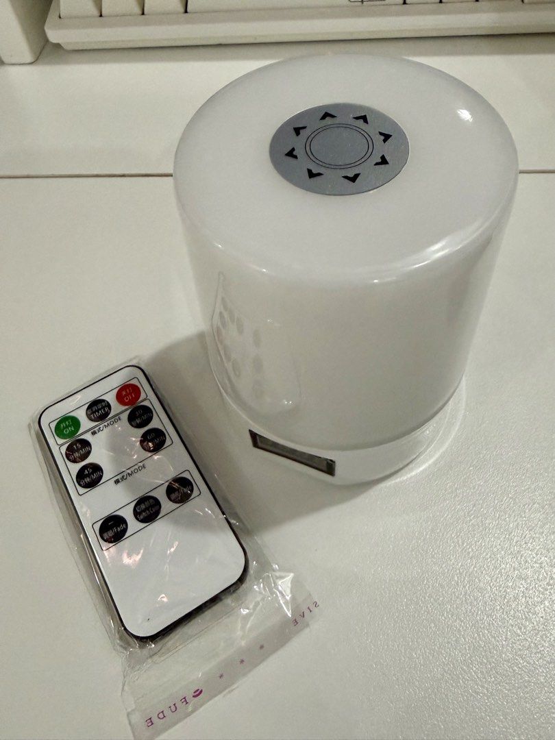 Bedhead Night Light with Remote Control (Category: Lighting) located in Manila. Submitted by chi.declutter (Listing ID 1468515097, Image 3). Description: - Modern white cylindrical bedhead night light - Features touch dimming with 3 adjustable brightness levels - Eye-friendly with zero strobe effect - Built-in digital display on the base - Includes a remote control (still in plastic sleeve) - Comes with the original retail box FREE DELIVERY for t