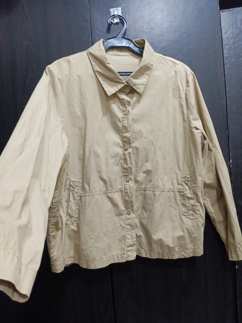 Beige Button-Up Long Sleeve Jacket (Category: Coats, Jackets and Outerwear) located in Manila. Submitted by ggarage.sale (Listing ID 1468688412, Image 2). Description: - Color: Versatile neutral beige - Style: Casual button-up jacket with a collared neckline - Fit: Relaxed and comfortable - Material: Lightweight cotton-blend fabric - Features: Long sleeves and two front functional pockets - Condition: Brand new / Excellent (ready to wear).