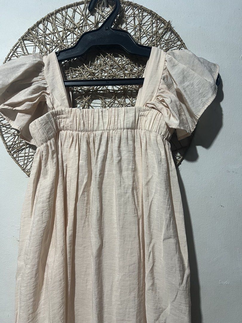 Beige Midi Dress with Flutter Sleeves (Category: Dresses) located in Pasig City. Submitted by ilmsf (Listing ID 1468695632, Image 2). Description: sign of usage size: 6yrs old.