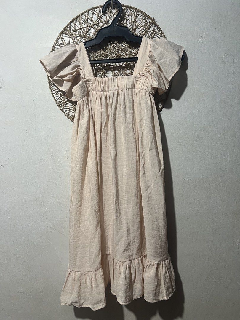 Beige Midi Dress with Flutter Sleeves (Category: Dresses) located in Pasig City. Submitted by ilmsf (Listing ID 1468695632, Image 1). Description: sign of usage size: 6yrs old.