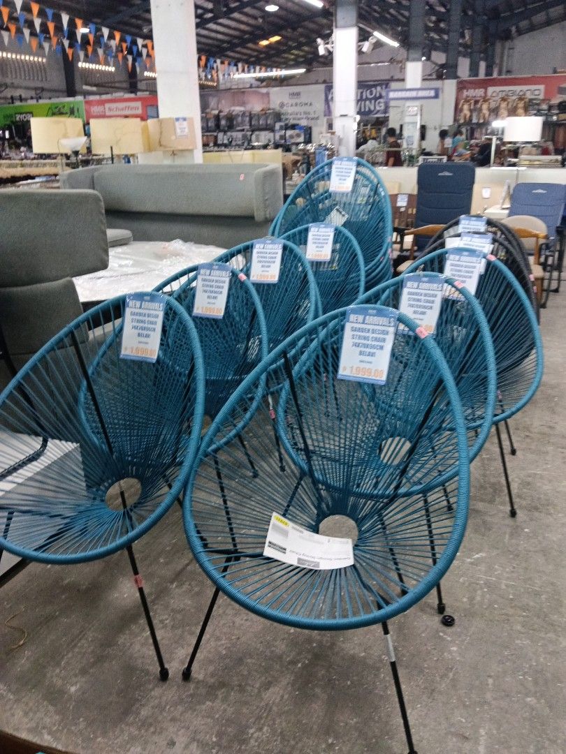 Belavi Garden Design String Chair Blue (Category: Chairs) located in Manila. Submitted by jesicahmrsantarosa (Listing ID 1468573998, Image 1). Description: - Type: Blue string chair with sturdy black metal legs - Versatility: Perfect for both indoor and outdoor setups - Dimensions: 74cm (L) x 70cm (W) x 96cm (H) - Design: Comfortable seating with a stylish circular opening at the base - Availability: Multiple pieces in stock, ready for purchase.