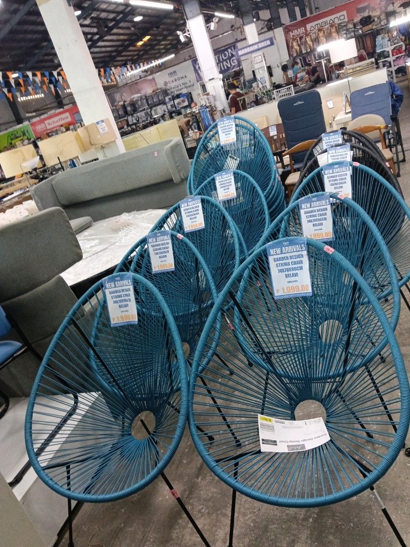 Belavi Garden Design String Chair Blue (Category: Chairs) located in Manila. Submitted by jesicahmrsantarosa (Listing ID 1468573998, Image 3). Description: - Type: Blue string chair with sturdy black metal legs - Versatility: Perfect for both indoor and outdoor setups - Dimensions: 74cm (L) x 70cm (W) x 96cm (H) - Design: Comfortable seating with a stylish circular opening at the base - Availability: Multiple pieces in stock, ready for purchase.