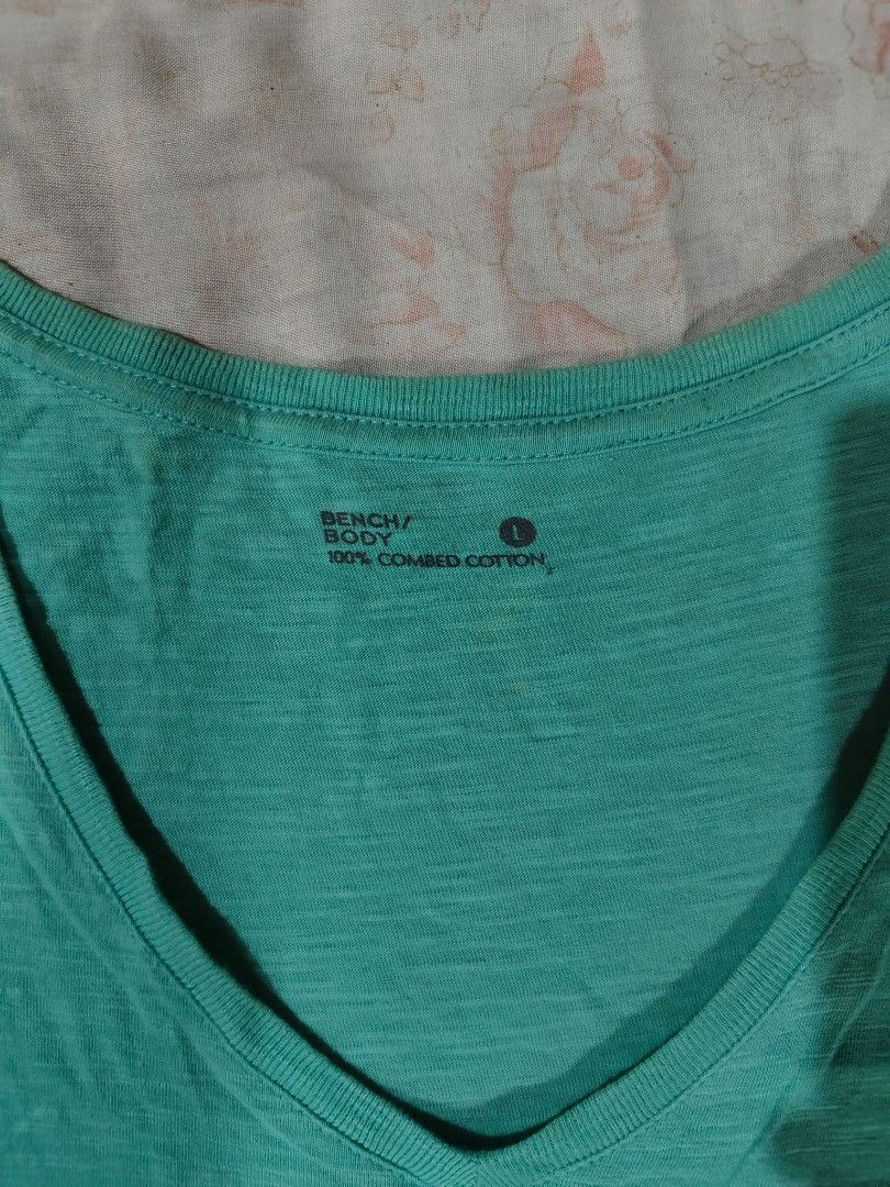 BENCH teal y2k V-neck pocket shirt (Category: Shirts) located in Bulacan. Submitted by angel.decluttersx (Listing ID 1468593003, Image 2). Description: large size L 28" W 17" cotton fabric material no issue.