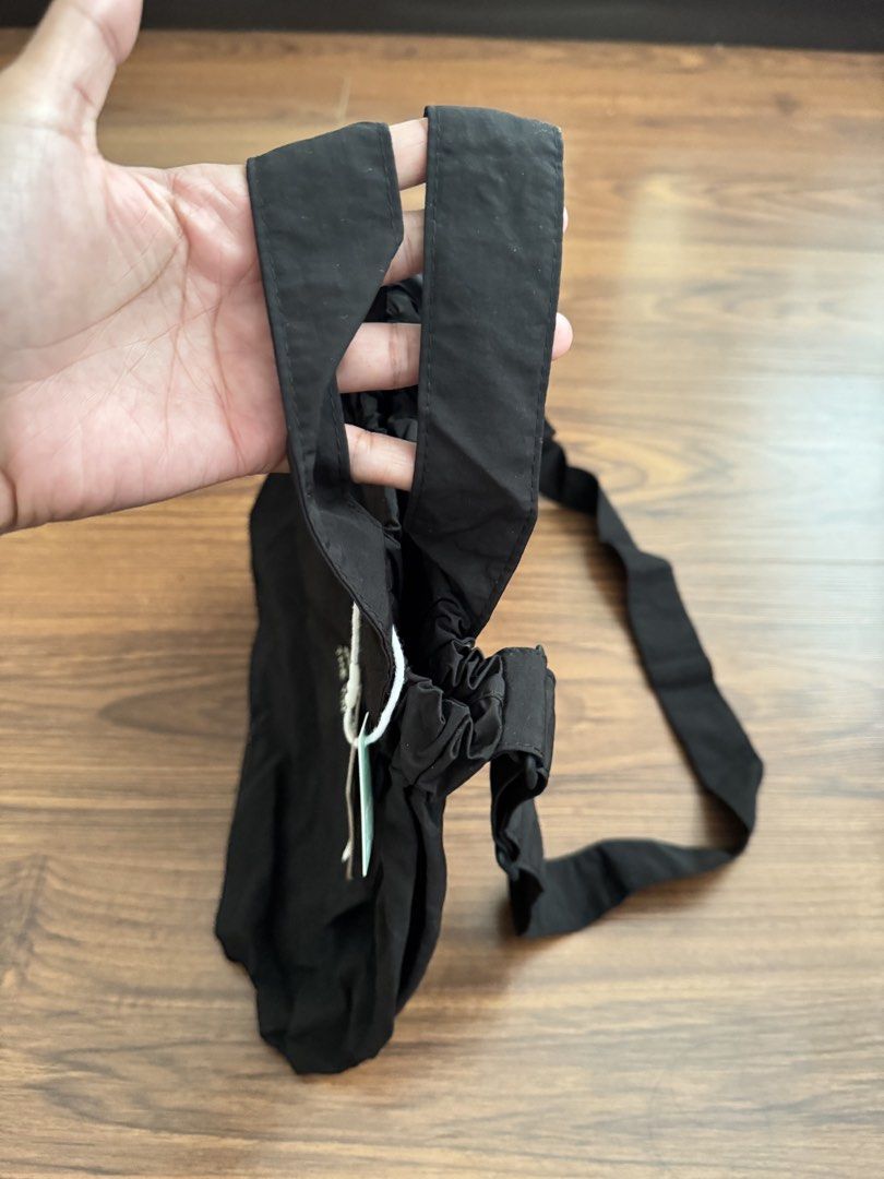Beyond The Vines Dumpling Bag Black (Category: Shoulder Bags) located in Rizal. Submitted by thrifty.mom (Listing ID 1468618662, Image 3). Description: - Brand: Beyond The Vines - Style: Dumpling Bag (Black) - Condition: Brand new with original tags, never used - Material: Lightweight and durable nylon - Features: Top handles, adjustable crossbody strap, front pocket with brand print, and magnetic top closure This is a gift / reward item from a c
