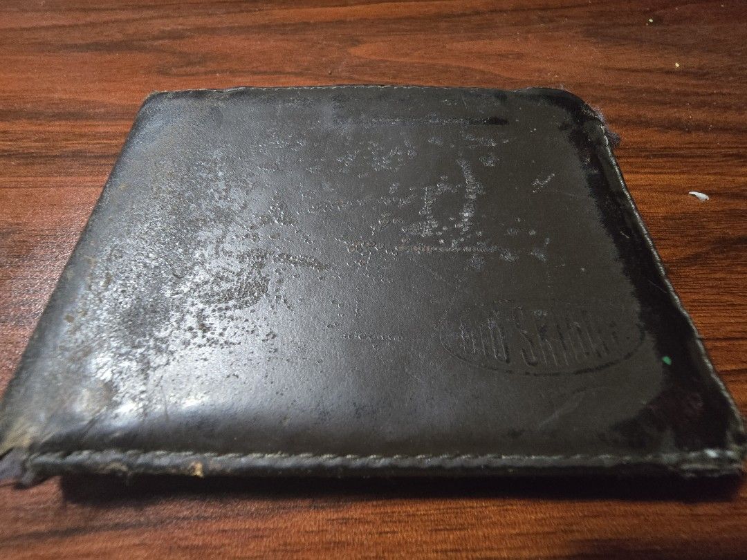 Big Skinny bifold wallet (Category: Wallets & Card Holders) located in Taytay. Submitted by kaboomerangle (Listing ID 1468708829, Image 1). Description: With multiple card slots, clear ID windows, and spacious bill compartments Proven to be thin on the pocket even with multiple cards in place Noticeable wear on the exterior leather and interior lining but otherwise in good condition .