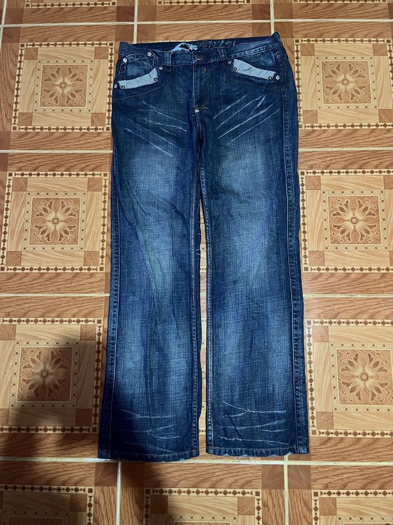 Big Train Osaka Denim Jeans 3L (Category: Jeans) located in Kidapawan. Submitted by azythrift (Listing ID 1468695790, Image 1). Description: - Brand: Big Train Osaka - Style: Dark wash denim jeans with straight leg fit and front thigh whiskering - Size: 3L - Material: 100% premium cotton - Key Features: Unique front flap pockets with contrast detailing and Japanese wave graphic with branding on the inner waistband - Condition: Excellent, highly r