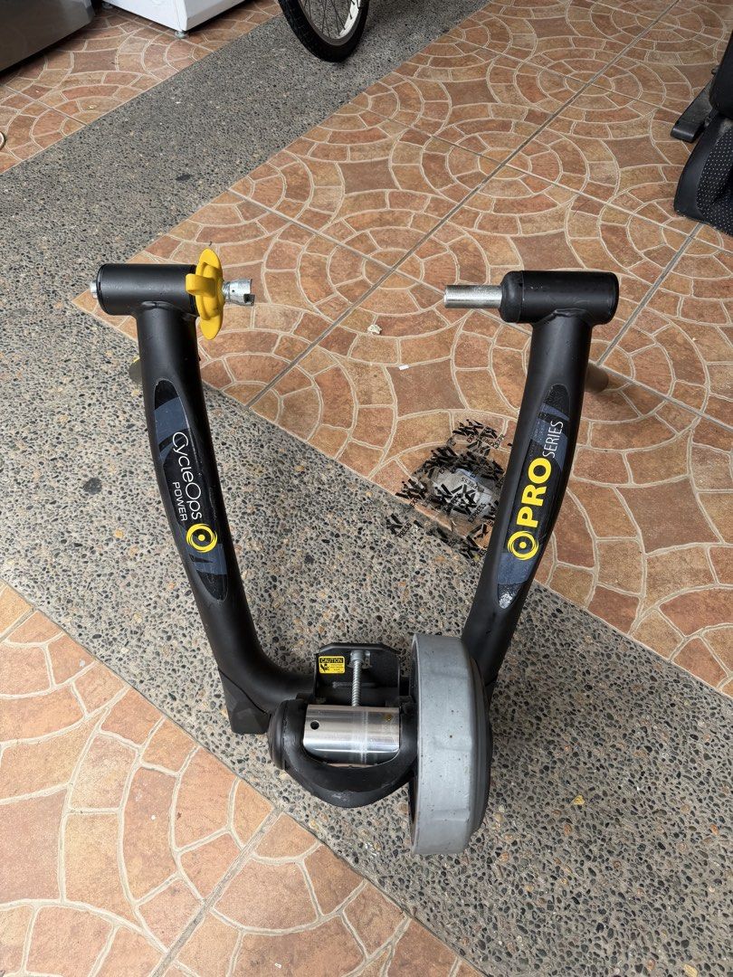 Bike Trainer (Category: Other Sports Equipment and Supplies) located in Bulacan. Submitted by mysticdeer.6d7f47 (Listing ID 1468599506, Image 1). Description: Ang bagay na nasa larawan ay isang indoor bicycle trainer na tinatawag na CycleOps Super Magneto Power Pro Series Trainer. Ginagamit ito upang gawing stationary exercise bike ang isang ordinaryong bisikleta para makapag-ensayo o makapag-bike kahit nasa loob ng bahay..