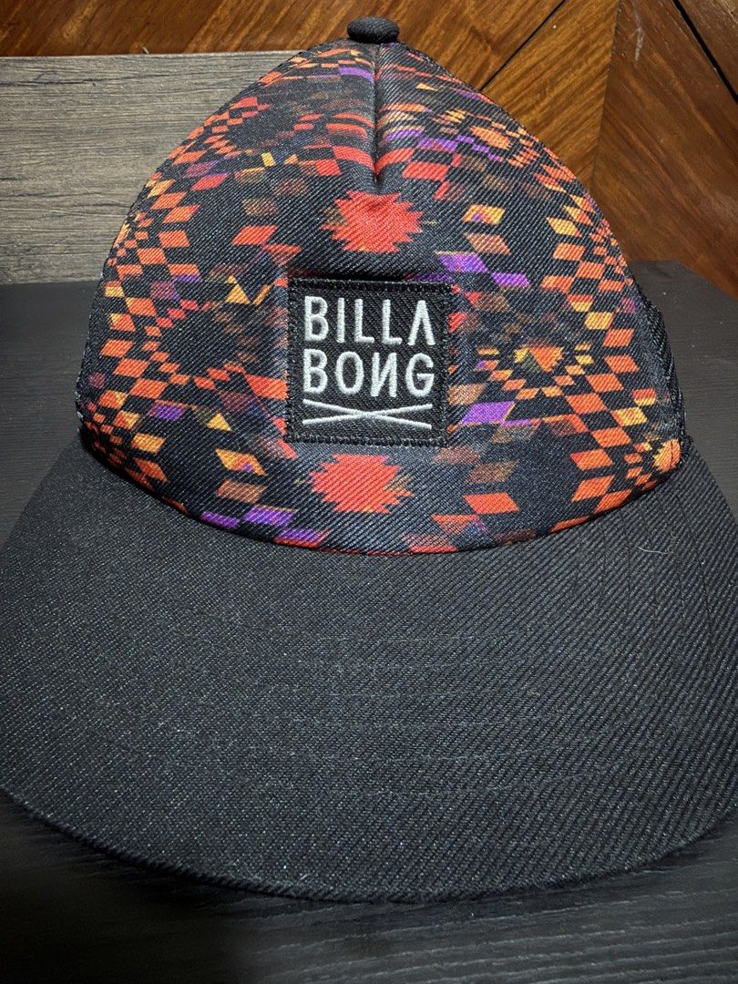Billabong Aztec Pattern Snapback Cap (Category: Caps & Hats) located in Manila. Submitted by db_collective (Listing ID 1468505759, Image 1). Description: - Brand: Billabong - Color: Classic black with geometric aztec pattern on the front - Features: Stitched logo patch, breathable mesh back - Fit: Adjustable plastic snap closure for a customized fit - Condition: good with signs of use.