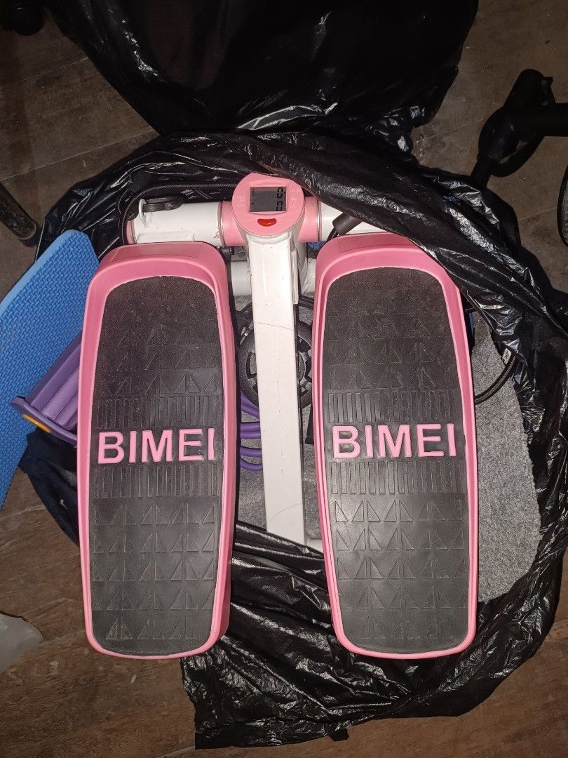 BIMEI Pink and White Mini Stepper Exercise Machine (Category: Cardio & Fitness Machines) located in Caloocan City. Submitted by glynneb (Listing ID 1468588244, Image 1). Description: - Color: Pink and white - Compact BIMEI mini stepper, perfect for small spaces - Digital monitor tracks count, time, and calories burnt - Textured pedals ensure feet stay secure during workouts - Ideal for daily cardio and leg toning at home.
