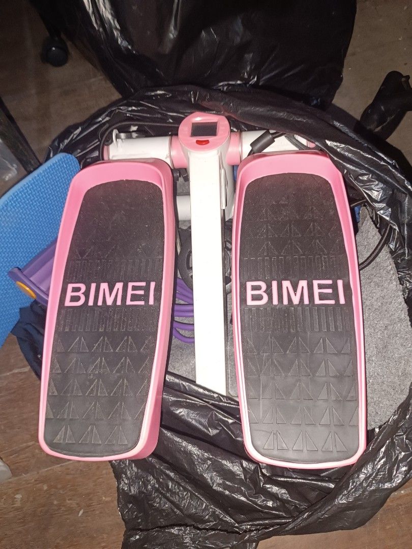 BIMEI Pink and White Mini Stepper Exercise Machine (Category: Cardio & Fitness Machines) located in Caloocan City. Submitted by glynneb (Listing ID 1468588244, Image 2). Description: - Color: Pink and white - Compact BIMEI mini stepper, perfect for small spaces - Digital monitor tracks count, time, and calories burnt - Textured pedals ensure feet stay secure during workouts - Ideal for daily cardio and leg toning at home.