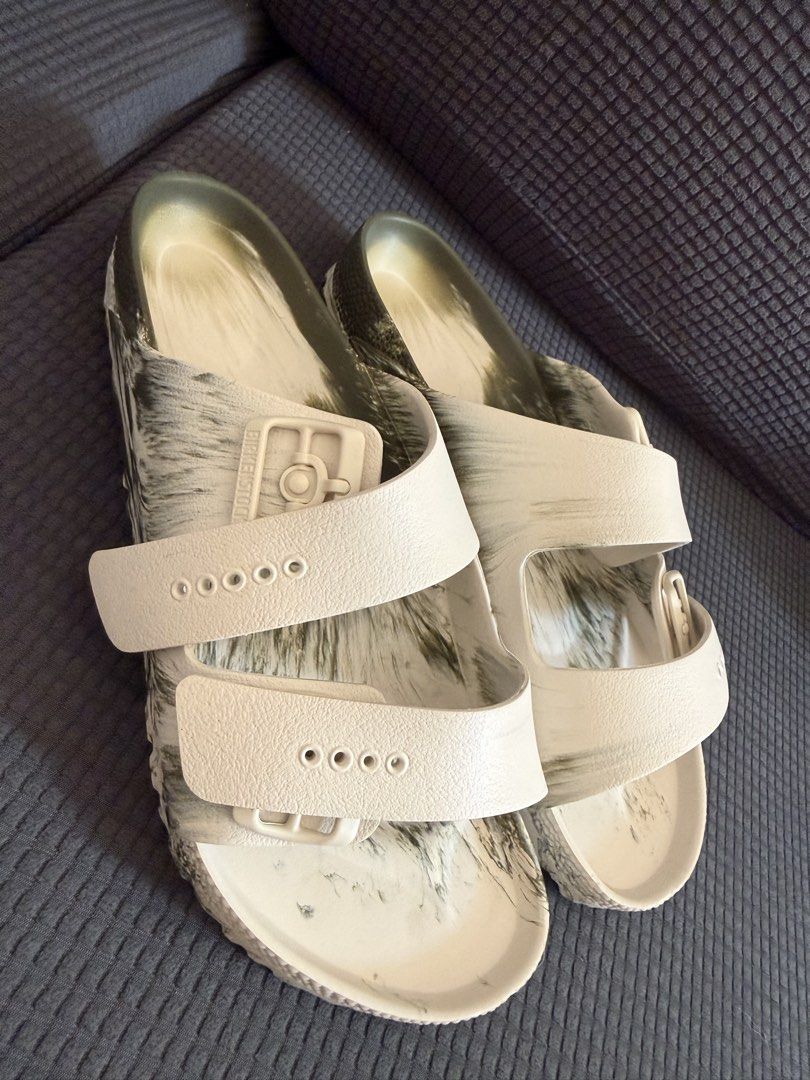 Birkenstock Arizona EVA Khaki Eggshell Multi (Category: Slippers & Slides) located in Cagayan de Oro. Submitted by cyndiiiluxury (Listing ID 1468528942, Image 2). Description: - Brand: Birkenstock - Model: Arizona EVA - Color: Khaki/Eggshell Multi Brush Pattern - Size: EU 43 / UK 9 / US M 10 (Regular Fit) - Condition: Brand new, never worn, includes original box - Material: Waterproof, lightweight, and flexible EVA.