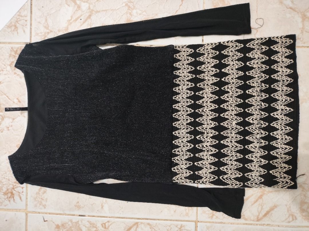 Black and Beige Long Sleeve Patterned Dress (Category: Dresses) located in Paranaque City. Submitted by enithing_preloved (Listing ID 1468570150, Image 1). Description: - Style: Long sleeve black dress, mid-thigh length - Neckline: Wide scoop neck, easy slip-on style - Top: Fitted with shimmering black fabric - Bottom: Patterned with alternating beige and black zig-zag stripes - Sleeves: Smooth black fabric - Occasion: Versatile for casual outing