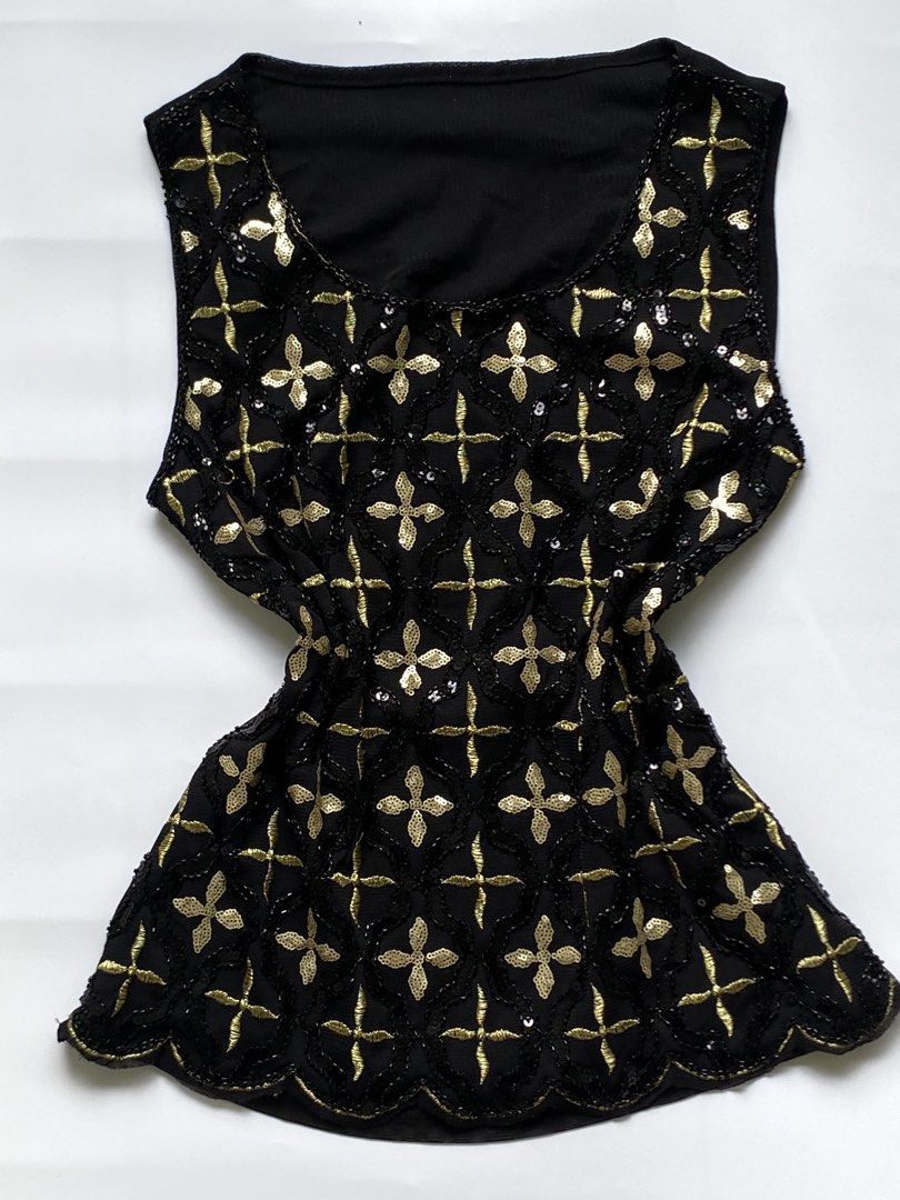 Black and gold beaded sequin sleeveless top (Category: Sleeveless) located in Manila. Submitted by petalfinds_ (Listing ID 1468549574, Image 1). Description: ˚⊱🪷⊰˚ full sequins and beaded black top ౨ৎ 𝐛𝐫𝐚𝐧𝐝: ౨ৎ 𝐬𝐢𝐳𝐞: medium to semi large 🫧⋆｡˚ 𝐝𝐞𝐭𝐚𝐢𝐥𝐬: super prettyyy! no issue. intricate design 💞 ─── ⋆⋅☆⋅⋆ ── 「 ✦ 𝐍𝐎 𝐂𝐎𝐃𝐄, 𝐈𝐍𝐕𝐀𝐋𝐈𝐃 𝐌𝐈𝐍𝐄 ✦ 」 𝓹𝓻𝓲𝓬𝓮: 169 𝓬𝓸𝓭𝓮: midnight.