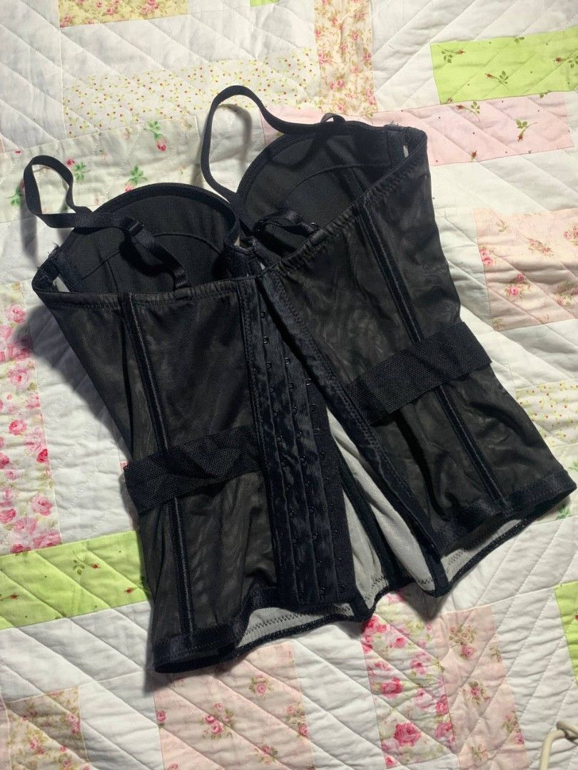 Black Corset Top (Category: Others Tops) located in Paranaque City. Submitted by dayiiee (Listing ID 1468695039, Image 2). Description: Elegant black corset top with sheer mesh panels, floral lace details, and structured cups. Features adjustable shoulder straps and hook-and-eye back closure for a fitted look. Perfect for date nights, parties, or styling with skirts and jeans. Size: Small to Semi-Medium (S–M) 🖤 Color: Black ✨ Style: Sexy, elegan