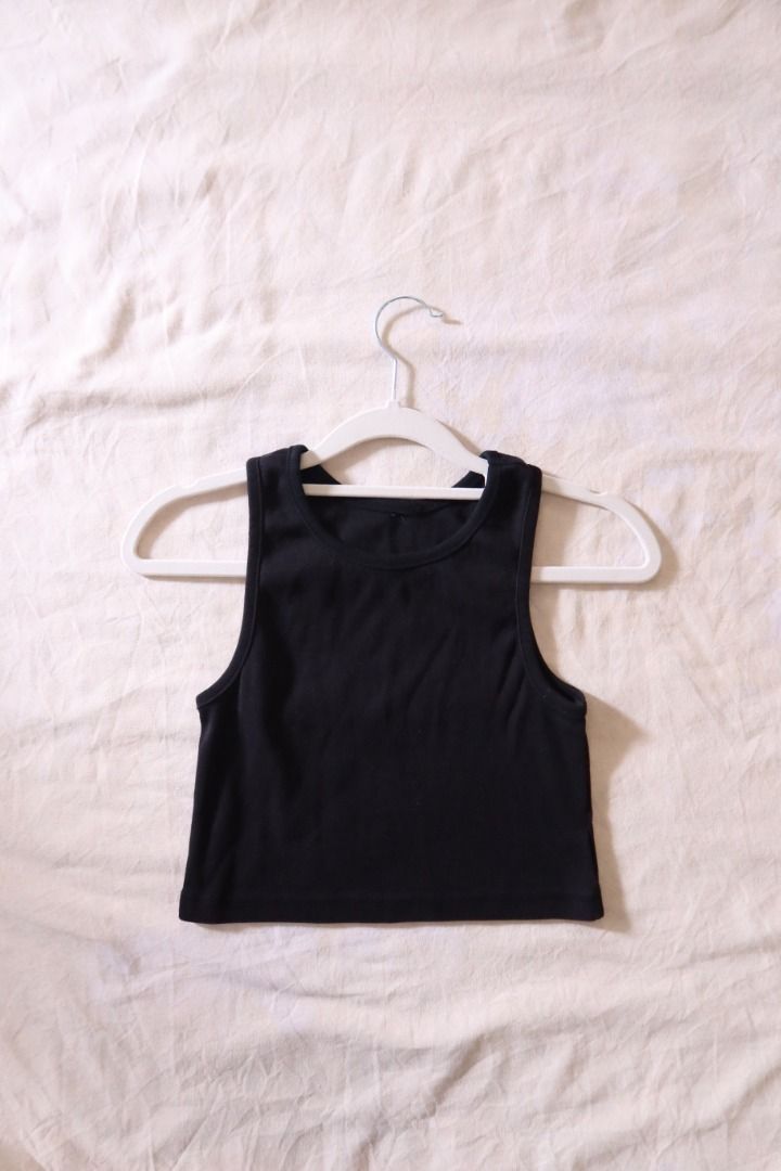 Black Crew Neck Crop Tank Top (Category: Sleeveless) located in Manila. Submitted by imama23 (Listing ID 1468536033, Image 3). Description: Condition: 7/10 Size: XXS-XS Location: Manila Shipping - Payment first before shipping - J&T, Grab, Lalamove (Buyer may choose preferred courier) - MOP: GCASH, Bank Transfer - Shipping to be shouldered by buyer .