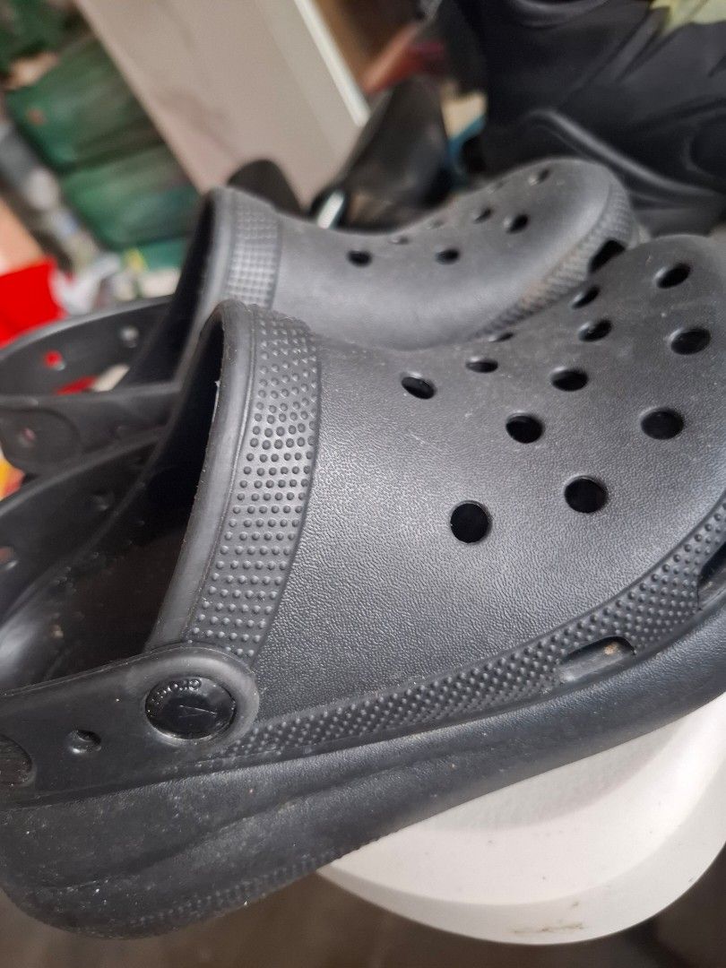 Black Crocs Classic Clogs (Category: Slippers and slides) located in Marikina City. Submitted by bags21.ph (Listing ID 1468503965, Image 2). Description: - Authentic Black Crocs clogs - Features iconic comfort footbed for all-day support - Slip-on design with breathable ventilation holes - Secure heel strap for a snug fit - Good traction on soles - Condition: Shows minor dust and light wear from regular use, ready for a quick cleanup - Perfect fo