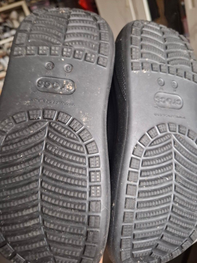 Black Crocs Classic Clogs (Category: Slippers and slides) located in Marikina City. Submitted by bags21.ph (Listing ID 1468503965, Image 3). Description: - Authentic Black Crocs clogs - Features iconic comfort footbed for all-day support - Slip-on design with breathable ventilation holes - Secure heel strap for a snug fit - Good traction on soles - Condition: Shows minor dust and light wear from regular use, ready for a quick cleanup - Perfect fo