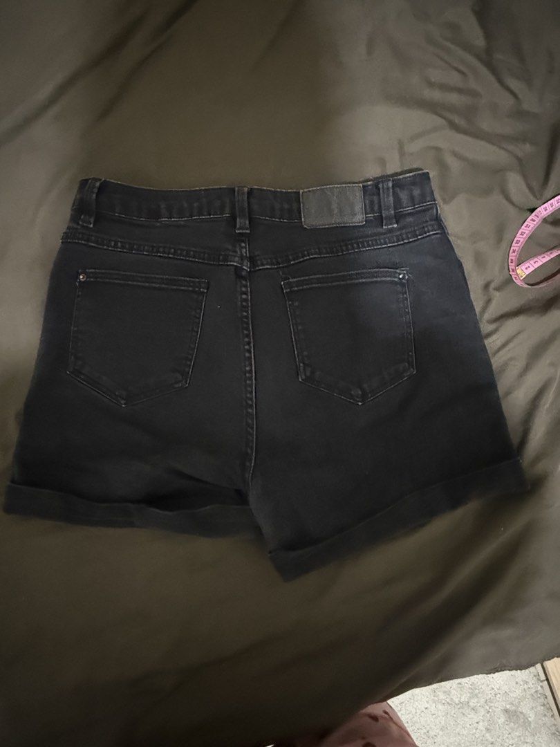 Black Denim Cuffed Shorts High Waisted (Category: Shorts) located in Quezon City. Submitted by turtleandfishes (Listing ID 1468680632, Image 2). Description: - Bought in Malaysia PDI - Style: High-waisted black denim shorts with cuffed hems - Fit: Slight stretch for a comfortable fit - Details: Classic five-pocket style with button closure and zipper fly - Measurements: ~15 inches across the waist, ~14 inches in length - Condition/Use: Versatile 
