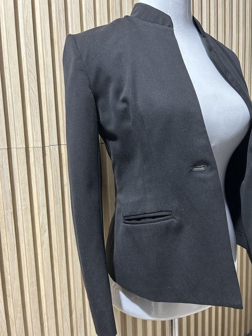 Black Labeth Mandarin Collar Blazer (Category: Coats, Jackets and Outerwear) located in Quezon City. Submitted by yourchingu16 (Listing ID 1468686261, Image 3). Description: - Great for office use - Style: Mandarin collar with a fitted waist - Closure: Single-button front - Pockets: Two front welt pockets - Details: Two decorative buttons on each cuff - Condition: Excellent.