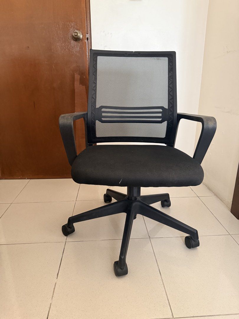 Black mesh ergonomic office chair with wheels (Category: Office Furniture & Fixtures) located in Antipolo. Submitted by mrgvictoria (Listing ID 1468561500, Image 1). Description: - Ergonomic design with a breathable black mesh backrest for all-day comfort - Comfortable padded seat cushion for daily seating support - Sturdy black plastic base equipped with five smooth-rolling caster wheels - Fixed armrests for standard arm support - Easy height ad