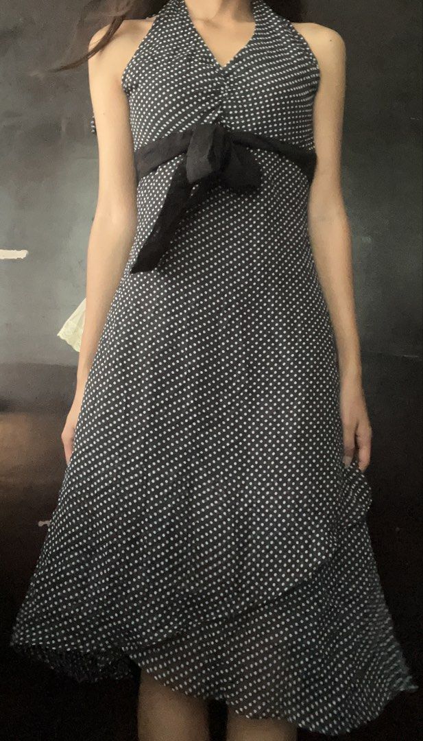 Black Polka Dot Halter Midi Dress with Bow (Category: Dresses) located in Talisay. Submitted by kitsaidy (Listing ID 1468619964, Image 1). Description: - Color & Pattern: Black with all-over white polka dots - Style: Halter neck with a ruched front and statement black fabric bow at the waist - Hemline: Trendy asymmetrical ruffled hem - Length: Midi (hits around mid-calf) - Fabric: Lightweight and breathable, ideal for PH weather and casual outing