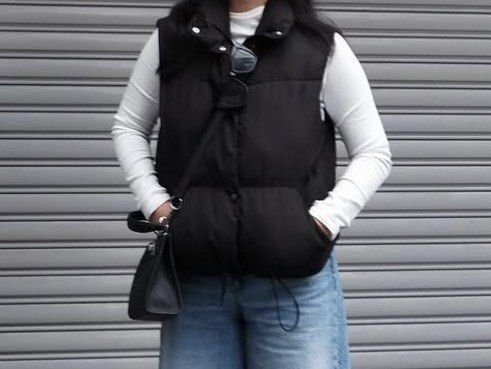 Black Puffer Vest Women (Category: Sleeveless) located in Manila. Submitted by leean0924 (Listing ID 1468524332, Image 2). Description: - Color: Classic Black - Material: Thick, warm puffer material designed for cold weather - Design: Stand-up collar to block out the wind - Closure: Convenient snap buttons down the front - Pockets: Functional side pockets for your essentials - Fit: Adjustable drawcord hem for a customized fit - Style: Great layer