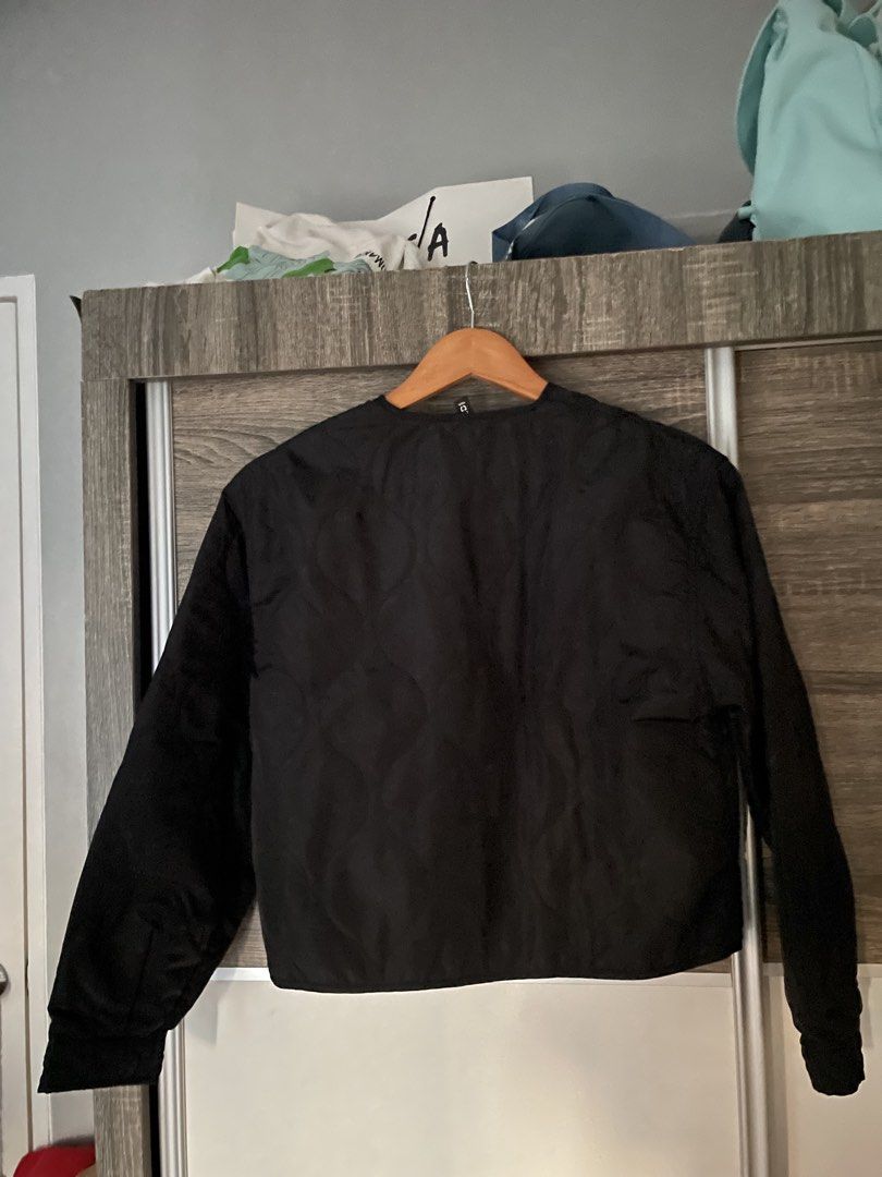 Black Quilted Jacket Button-up Outerwear (Category: Coats, Jackets and Outerwear) located in Manila. Submitted by iyaalexi (Listing ID 1468666605, Image 2). Description: - Colour: Solid black - Style: Quilted lightweight jacket - Closure: Front buttons - Pockets: Two front pockets with button details - Neckline: Crew neck - Sleeves: Long sleeves - Condition: Excellent, pre-loved/new - Perfect for daily layering and casual outifts.