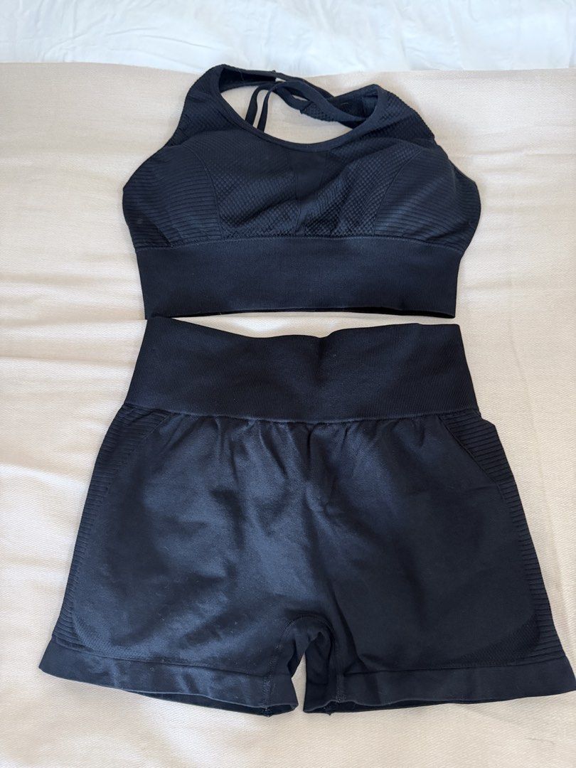 Black Seamless Workout Set Crop Top and Shorts (Category: Activewear) located in Taguig. Submitted by mengxir20193848 (Listing ID 1468543785, Image 2). Description: - Color: Black - Set includes: Supportive sports bra with criss-cross back and high-waisted scrunch butt biker shorts - Material/Design: Ribbed underband and side panels for maximum stretch and comfort - Fit: Super flattering, great for gym workouts and active lifestyles - Condition: 