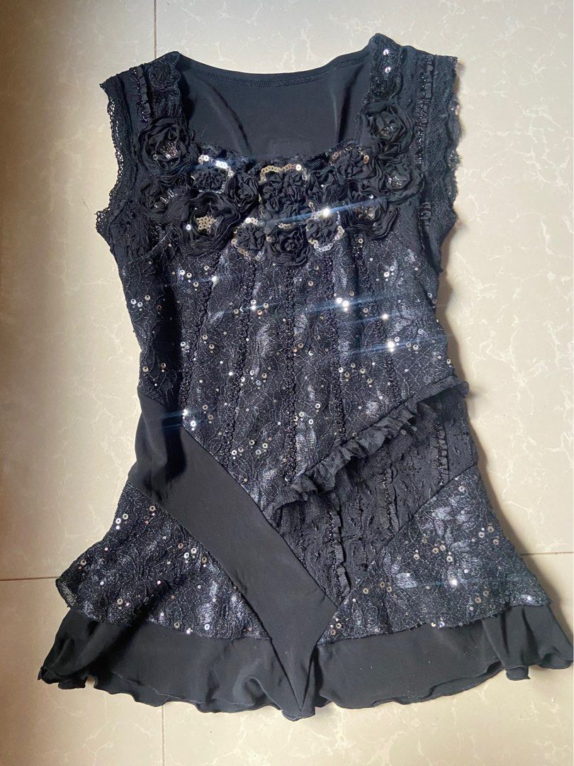 black sleeveless top with sequin embellishments (Category: Sleeveless) located in Pagadian. Submitted by jellsnow (Listing ID 1467096012, Image 1). Description: in good condition loc: pagadian city .
