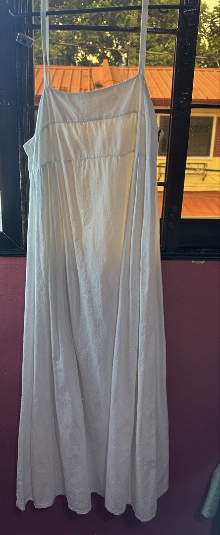 Blue and White Cami Maxi Dress (Category: Dresses) located in Cavite. Submitted by luxuryitem17 (Listing ID 1468568880, Image 2). Description: - Set of 2 long cami dresses (Solid Blue and White) - Features thin shoulder straps and a chic square neckline - Relaxed, flowy fit down to the ankles - Versatile basics for casual days out or layering in warm weather.