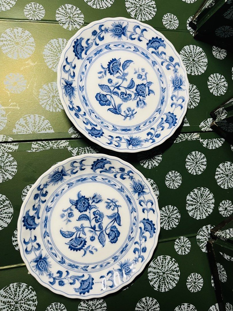 Blue and white ceramic small plates set (Category: Dinnerware & Cutlery) located in Malabon City. Submitted by mgsurplus (Listing ID 1468653718, Image 1). Description: - Set of 2 small ceramic plates - Measures approximately 6 inches across - Traditional blue and white porcelain design with intricate floral patterns - Elegant scalloped rims - Ideal for serving small snacks, appetizers, or home display.