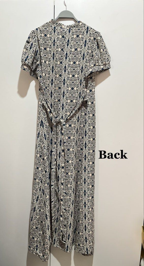 Kamiseta Maxi Dress (Category: Dresses) located in Marikina City. Submitted by charmhazel_ (Listing ID 1468536493, Image 3). Description: - Maxi dress with navy blue and cream geometric print - High neckline, short puff sleeves, and zipped back closure - can fit from size Medium to Large - P800 + sf.
