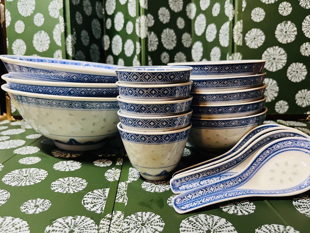Blue and White Rice Grain Porcelain Dinnerware Set (Category: Dinnerware & Cutlery) located in Malabon City. Submitted by mgsurplus (Listing ID 1468655176, Image 2). Description: -3 large bowls, 5 small soup bowls, 5teacups ,4 spoons - Traditional blue and white Chinese porcelain tableware set - Features a translucent rice grain pattern with hand-painted floral centers and geometric borders - Includes a complete matching set of large serving bowl