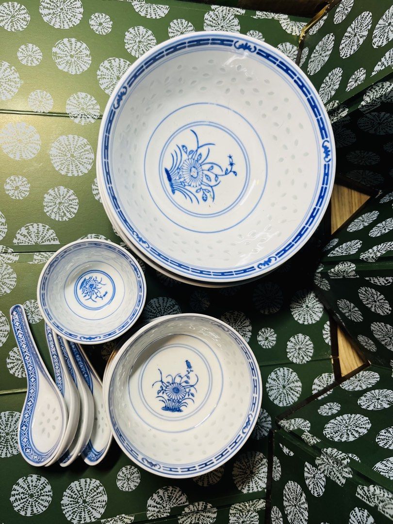 Blue and White Rice Grain Porcelain Dinnerware Set (Category: Dinnerware & Cutlery) located in Malabon City. Submitted by mgsurplus (Listing ID 1468655176, Image 1). Description: -3 large bowls, 5 small soup bowls, 5teacups ,4 spoons - Traditional blue and white Chinese porcelain tableware set - Features a translucent rice grain pattern with hand-painted floral centers and geometric borders - Includes a complete matching set of large serving bowl