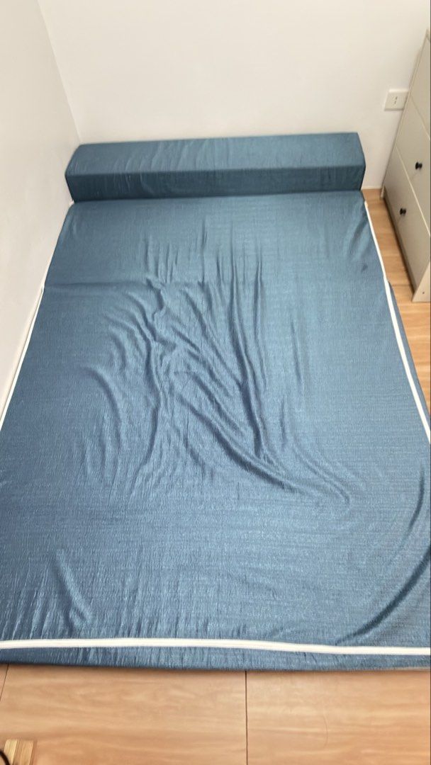 Blue Convertible Sofa Bed with Pillows (Category: Sofas) located in Las Pinas. Submitted by ann_1239 (Listing ID 1468554174, Image 3). Description: Versatile blue fabric convertible sofa bed. Easily transforms from a compact couch to a flat mattress. Includes two matching toss pillows. Perfect space-saving furniture for apartments, living rooms, or guest rooms..