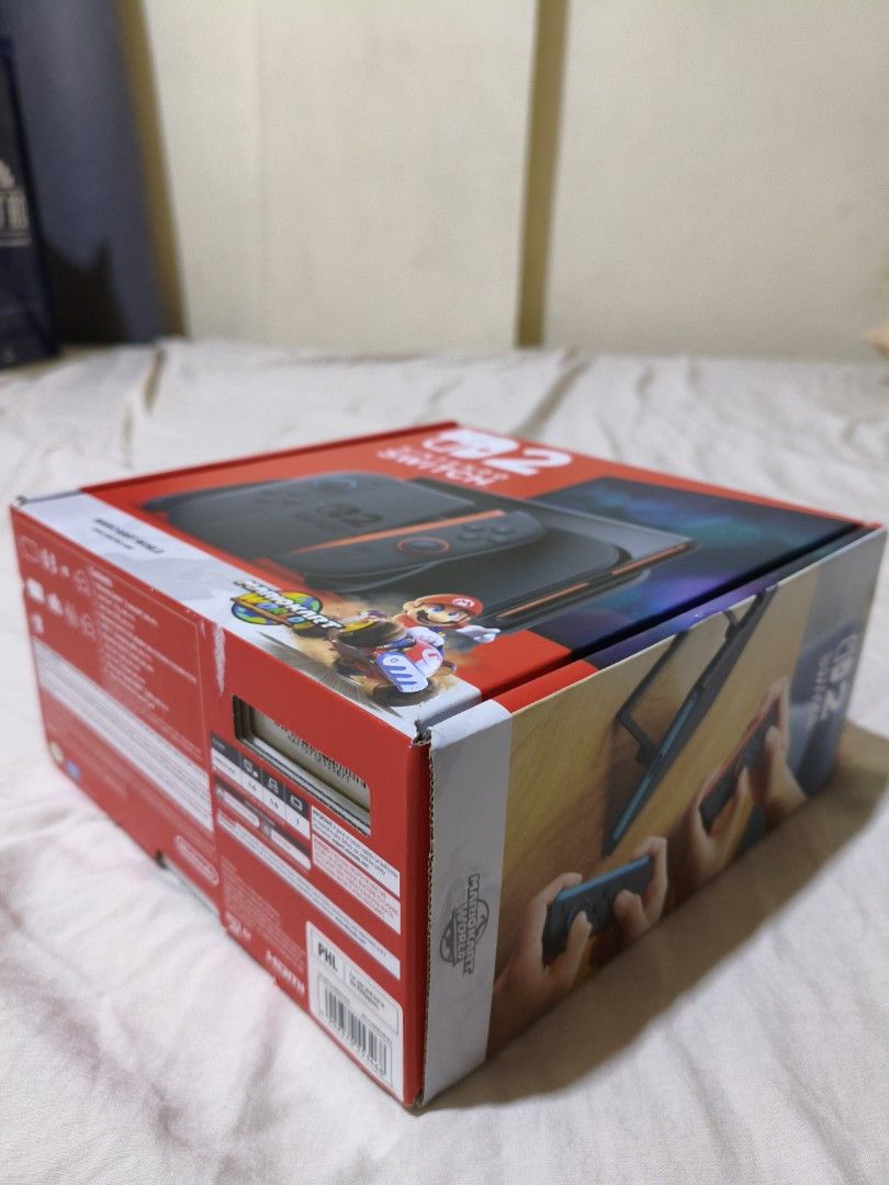 BOX ONLY: Nintendo Switch Mario Kart World Edition Console Box (Category: Everything Else Others) located in Pasig City. Submitted by garage.sale89 (Listing ID 1468627175, Image 2). Description: - Nintendo Switch box with Mario Kart World graphics - Red and white packaging featuring product details and barcode - Box only (no console included) - Great find for collectors or anyone needing a replacement box.