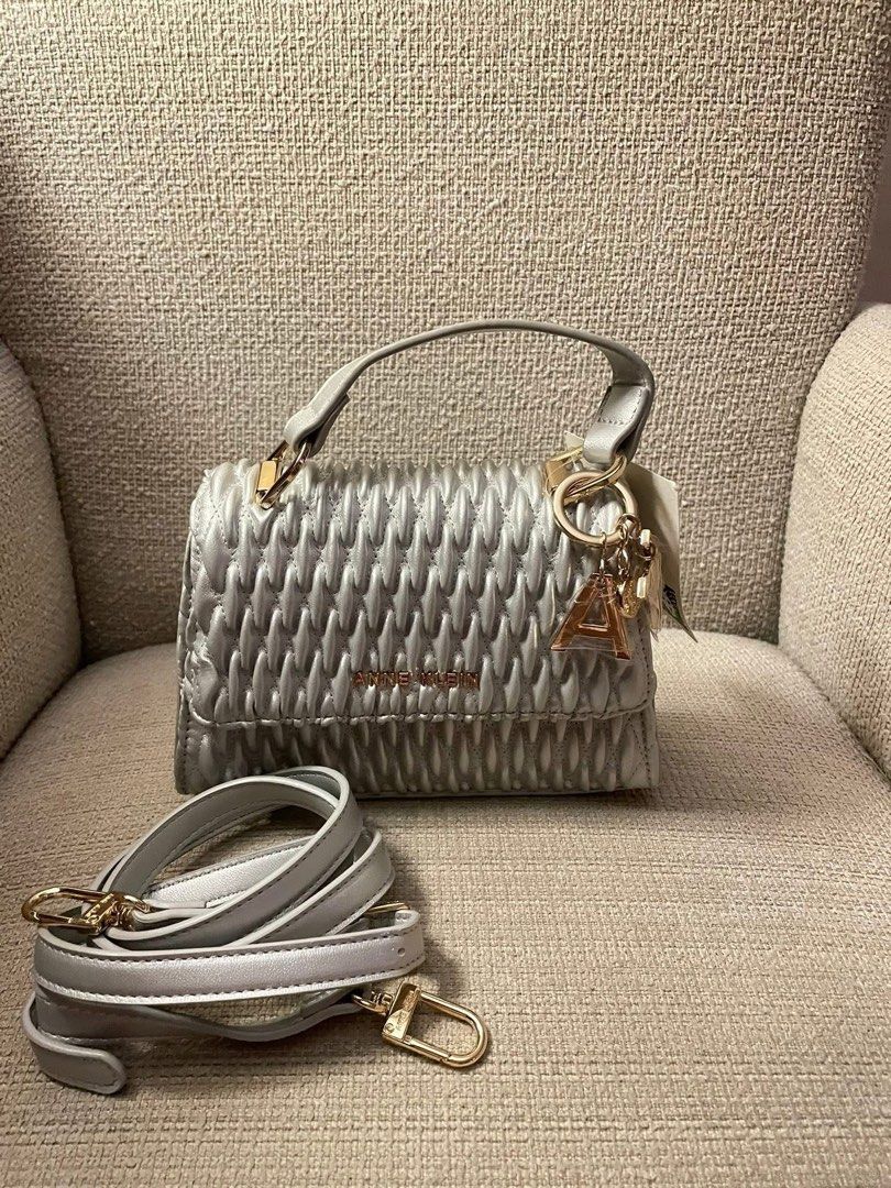 Brand new Anne Klein Silver Bag (Category: Cross-body Bags) located in Quezon City. Submitted by lovedbysloane (Listing ID 1468575393, Image 1). Description: - BrandNew -From US - $78 on tag.