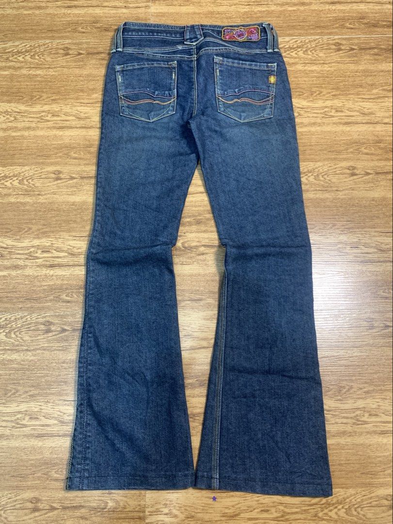 Brappers LSB225D Flare Jeans Size S (Category: Jeans) located in Davao. Submitted by legitseller1111 (Listing ID 1468541003, Image 2). Description: - Brand: Brappers - Style: Flare jeans with low-rise fit - Model: LSB225D - Size: S (tag inside) - Color/Wash: Dark wash denim - Details: Unique contrast front stitching, branded metal button, inner label - Back Pockets: Eye-catching colorful embroidered wave patterns - Material: 63% cotton, 37% T-400