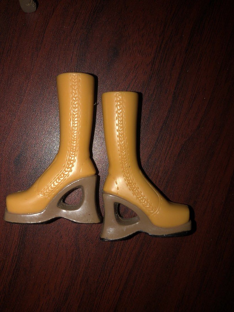 Bratz Doll Boots Lot Two Pairs (BUNDLE) (Category: Kids Toys) located in Angeles City. Submitted by bratzdylan (Listing ID 1468626915, Image 3). Description: Can be separated (250 each) - Pair 1: Yellow and brown color block with platforms and curved heels - Pair 2: Solid tan with cutout wedge heels and front stitching - Ideal replacement pieces for doll collectors and customizers - Compatible with standard fashion dolls - Condition: Great / Read