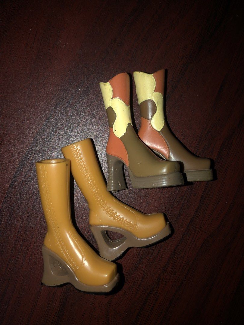 Bratz Doll Boots Lot Two Pairs (BUNDLE) (Category: Kids Toys) located in Angeles City. Submitted by bratzdylan (Listing ID 1468626915, Image 1). Description: Can be separated (250 each) - Pair 1: Yellow and brown color block with platforms and curved heels - Pair 2: Solid tan with cutout wedge heels and front stitching - Ideal replacement pieces for doll collectors and customizers - Compatible with standard fashion dolls - Condition: Great / Read