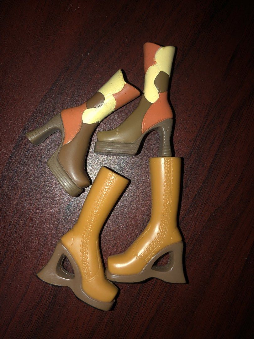 Bratz Doll Boots Lot Two Pairs (BUNDLE) (Category: Kids Toys) located in Angeles City. Submitted by bratzdylan (Listing ID 1468626915, Image 2). Description: Can be separated (250 each) - Pair 1: Yellow and brown color block with platforms and curved heels - Pair 2: Solid tan with cutout wedge heels and front stitching - Ideal replacement pieces for doll collectors and customizers - Compatible with standard fashion dolls - Condition: Great / Read