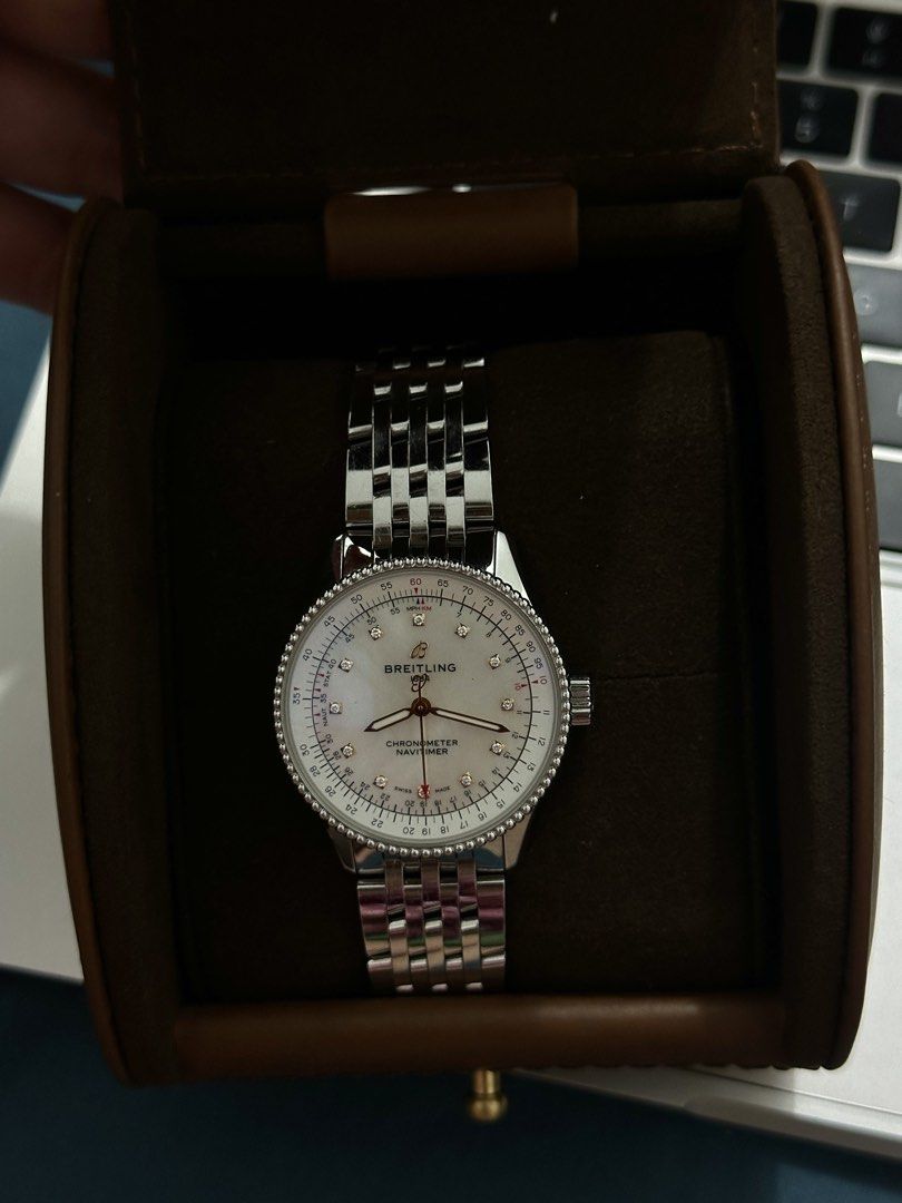 Breitling Navitimer Automatic 35 Stainless Steel Watch (Category: Luxury Watches) located in Manila. Submitted by happyeagle.d9ca2f (Listing ID 1468687797, Image 2). Description: The Breitling Navitimer 35 features an elegant design with an anti-magnetic stainless steel case, a mother-of-pearl dial, and diamond hour markers. Its stainless steel beaded bezel surrounds and protects a double-glare-resistant sapphire crystal. Completing the look is a