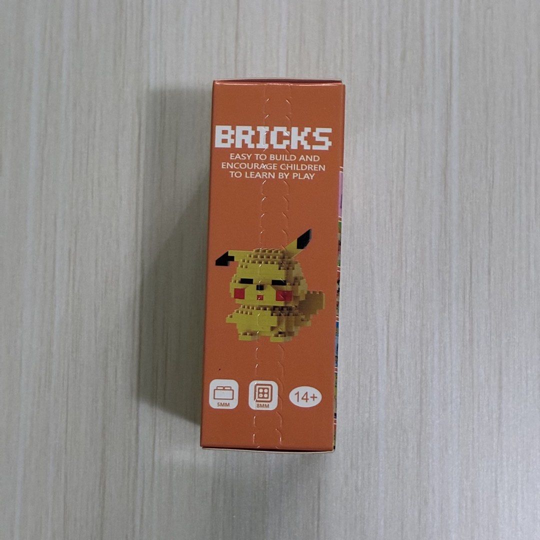 Bricks Mini Building Blocks - Pikachu (Category: Lego & Building Sets) located in Quezon City. Submitted by kc.collections (Listing ID 1468627640, Image 3). Description: Brand new and sealed RFS: Decluttering. Unused gift.