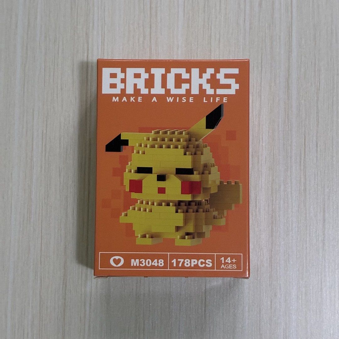 Bricks Mini Building Blocks - Pikachu (Category: Lego & Building Sets) located in Quezon City. Submitted by kc.collections (Listing ID 1468627640, Image 1). Description: Brand new and sealed RFS: Decluttering. Unused gift.