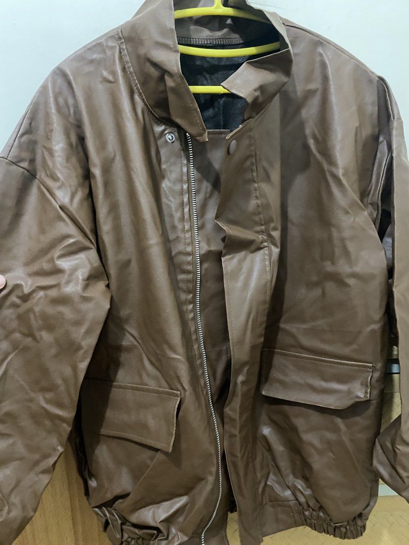 Brown Leather bomber jacket (Category: Coats, Jackets and Outerwear) located in Pasig City. Submitted by avery4444 (Listing ID 1468706134, Image 3). Description: Nagamit lang once super good condition .