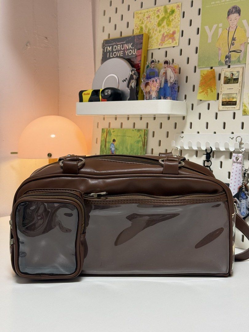 brown leather ita bag (Category: Shoulder Bags) located in Mandaluyong City. Submitted by keiscart (Listing ID 1468564906, Image 2). Description: (negotiable just dm me!) fits 3 pocahols, 1 doll (up to 13cm) with shoulder strap — very good quality!!! (unlike sa sho/pee).