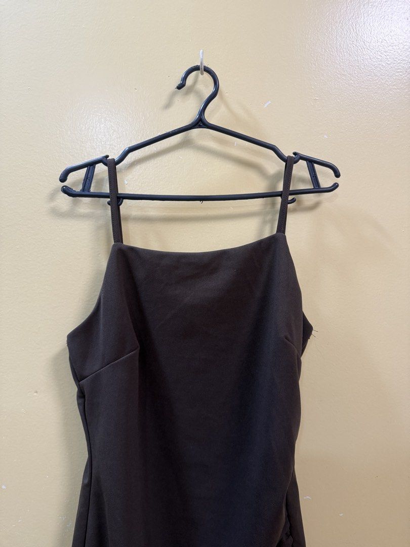 Brown Midi Dress (Category: Dresses) located in Makati City. Submitted by shoprory (Listing ID 1468590587, Image 2). Description: Thrifted brown midi dress Size: fits small to medium Condition: 10/10 Used only once No stains, holes, or damage RFS: Decluttering Shipping fee shouldered by buyer. Slightly negotiable for sure buyers..