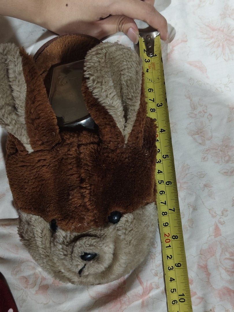 brown plush animal rabbit slippers (Category: Slippers and slides) located in Bulacan. Submitted by angel.decluttersx (Listing ID 1468630938, Image 3). Description: size 34-35 9 inches Length needs washing lang no issue ‼️ actual ww provided (refer to photos) (I'm size 36 for reference ).