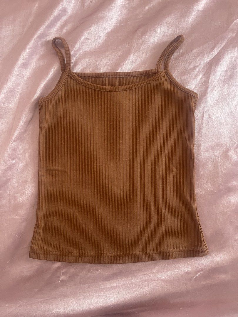Brown spaghetti strap tank top (XS-S) (Category: Sleeveless) located in Manila. Submitted by lovedbymidge (Listing ID 1468649580, Image 1). Description: 🩷 for xs-s girlies (worn twice, in good condition) 🚚 lalamove or grab express (sf shouldered by the buyer!).